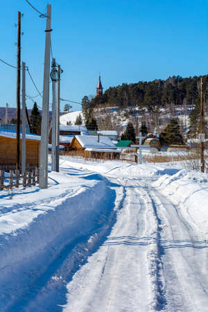 Winter snow-covered road to the village of Ust-Pisanaya, Kemerovo region - Kuzbassの写真素材