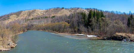 Panoramic view of the taiga river Uryup in the foothills of the Kuznetsky Alatau ridge, Kemerovo...