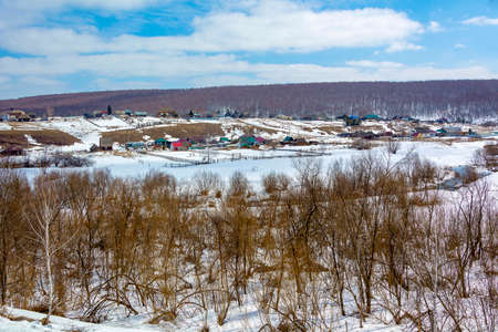 Spring view from the highway to the Siberian village of Ust-Khmelevka, Kemerovo region-Kuzbassの写真素材