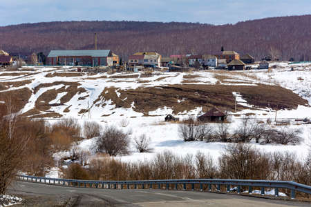 Spring view from the highway to the Siberian village of Ust-Khmelevka, Kemerovo region-Kuzbassの写真素材