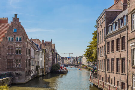 Travel Belgium medieval european city town background with canal  Ghent, Belgiumのeditorial素材