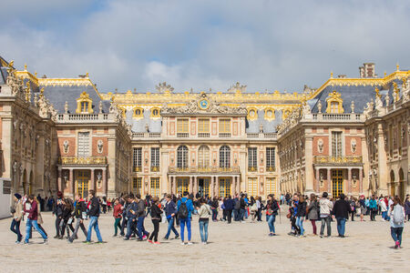 VERSAILLES, FRANCE - MAY 14, 2014: Every day many tourists wish to visit Versailles Palace. The Palace Versailles was a royal chateau. It was added to the UNESCO list of World Heritage Sites.のeditorial素材