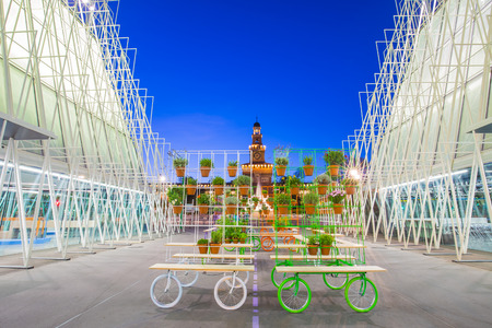 Milan, Italy - April 14, 2015: Expo 2015 Gate in Piazza Castello, Milan, Italy with the Sforza Castle in background on April 14, 2015. Expo 2015 is the next Universal Exposition.のeditorial素材