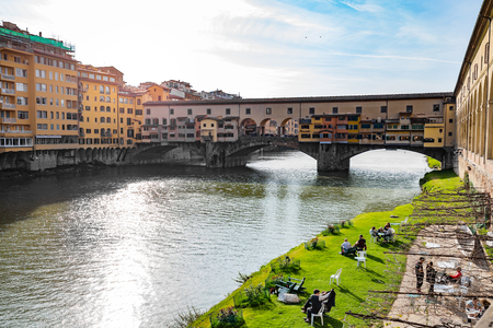 Florence, Italy - April 10, 2015: The Ponte Vecchio is a Medieval stone closed-spandrel segmental arch bridge over the Arno River, in Florence, Italy.のeditorial素材