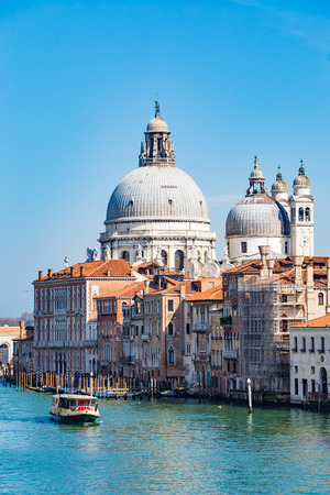 Venice, Italy - April 12, 2015: Gondola with the tourist in Venice, Italy. The gondola is a traditional, flat-bottomed Venetian rowing boat, well suited to the conditions of the Venetian lagoon.のeditorial素材