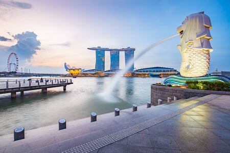 Singapore City, Singapore - July 18, 2015: Marina Bay skyline and Merlion in the morning. The Marina Bay is a bay near Central Area in of Singapore, and lies to the east of the Downtown Core.のeditorial素材