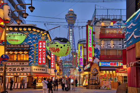 Osaka Japan- January 4, 2016: Tsutenkaku is a tower and well-known landmark of Osaka Japan and advertises Hitachi. It is located in the Shinsekai district of Naniwa-ku Osaka.のeditorial素材