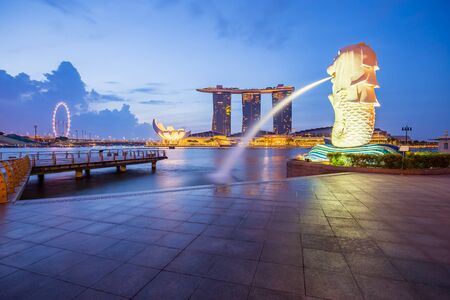 Singapore City, Singapore - July 18, 2015: Singapore city skyline at twilight. The Marina Bay is a bay near Central Area in of Singapore and lies to the east of the Downtown Core.のeditorial素材