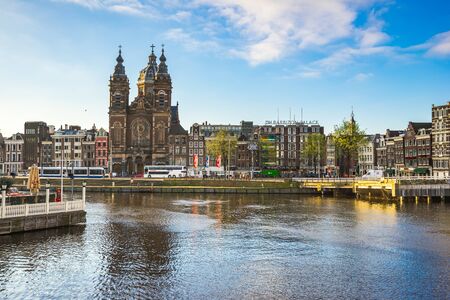 Amsterdam, Netherlands - April 13, 2016: The view of Amsterdam city with the canal in Netherlands.のeditorial素材