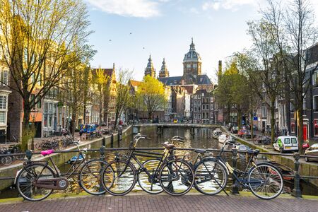 Amsterdam, Netherlands - April 13, 2016: The view of Amsterdam city with the canal in Netherlands.のeditorial素材