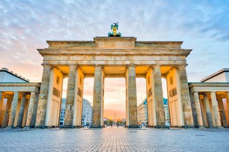 Brandenburg Gate with the sunrise in Berlin, Germany.の写真素材