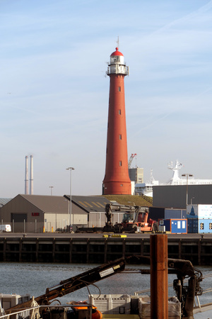 Tall lighthouse in portの写真素材