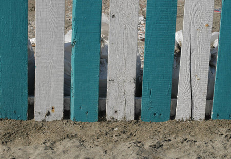 staccionatadi varnished wood on the sandの写真素材