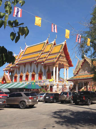 SAMUT PRAKAN, THAILAND - MAY 1, 2015: Thai Buddhist decorate temple with Thailand flag and yellow Buddhism symbol flag to celebrating.のeditorial素材