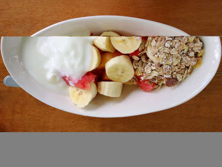 Breakfast - Watermelon and banana muesli with yogurt, copy space