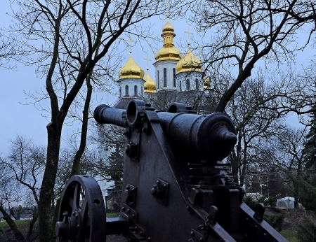 Cannon of the 19th century against the background of the churchの写真素材
