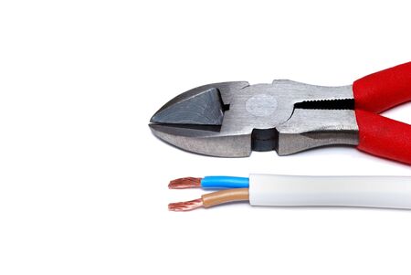 Red pliers and a white wire on white backgroundの写真素材