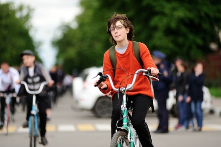 Orel, Russia - May 28, 2017: Bikeday. Young girl riding bicycles selective focusのeditorial素材