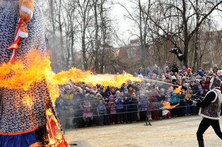 Orel, Russia - February 26, 2017: Maslenitsa fest. Crowd of people watching Maslenitsa Lady burnt horizontalのeditorial素材
