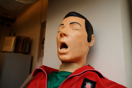 Orel, Russia - March 28, 2017: Russian military bunker inside. Training male mannequin with open mouth and tears in shut eyes closeupのeditorial素材