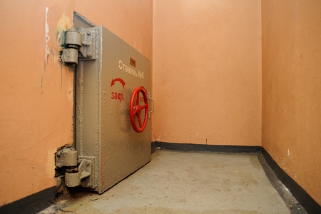 Orel, Russia - March 28, 2017: Russian military bunker inside. Armored door in empty roomのeditorial素材