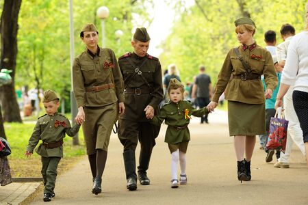 Orel, Russia - May 9, 2016: Celebration of 71th anniversary of the Victory Day (WWII). Family in soviet military uniform horizontalのeditorial素材