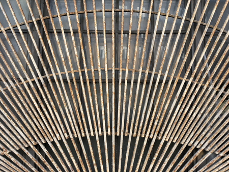 Old metal lattice on window texture background front viewの写真素材