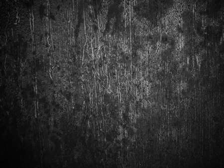 defocused grunge black white cement abstract wall background with reliefの写真素材