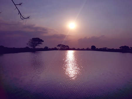Beautiful sunset from the middle of the lakeの写真素材