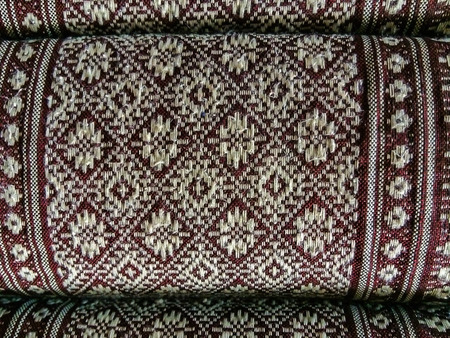 Background Thai art on the pillow.