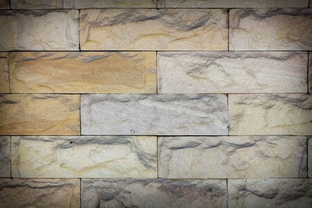 Texture of the  stone wall background abd vignetting.の写真素材