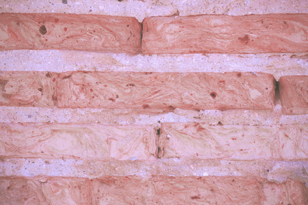 Texture of crack brick wall background by vintage tone.の写真素材