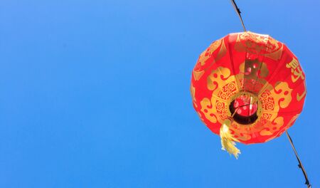 Soft focus the red china lamp and the sky background. の写真素材