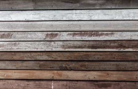 Drak light texture old wood wall background.の写真素材