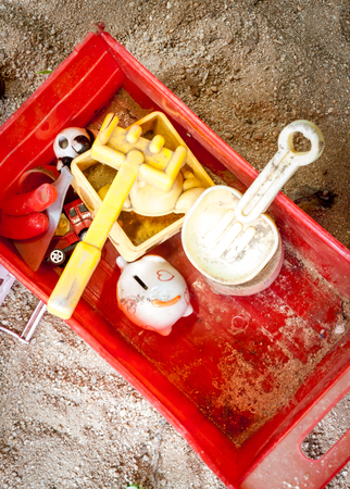 The old toys on the sand background and vignetting.の写真素材