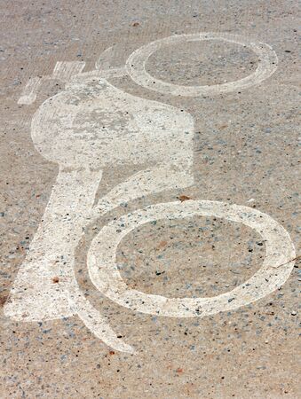 Symbol motorbike lane on the road background.の写真素材