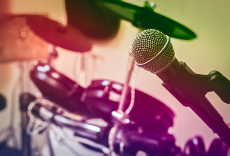 Microphone on blur drum background.の写真素材