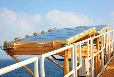 solar cell at offshore platform and sea beautiful blue sky.
