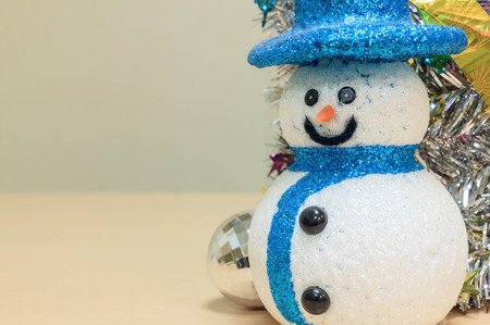 snowman,colorful Christmas decoration on wood background.の写真素材