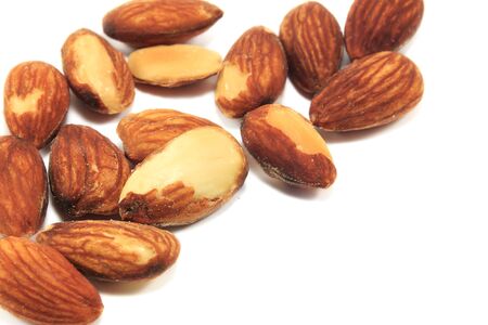 Selective focus almonds on white background.の写真素材