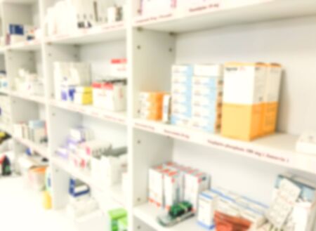 blur background drug shelves in drug store.の写真素材