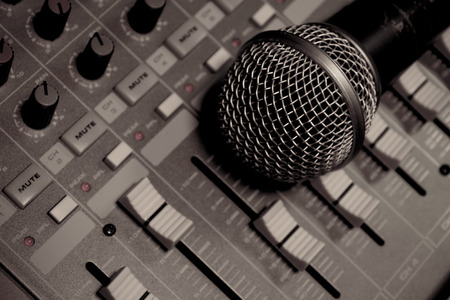 microphone on sound mixer background.