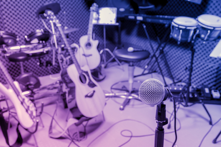 selective focus microphone and blur musical equipment guitar ,bass, drum piano, percussionist,lyric, background.の写真素材