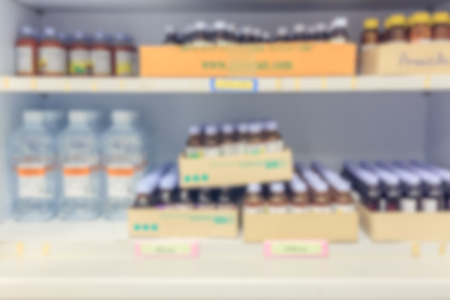 blur background drug shelves in drug store.の写真素材