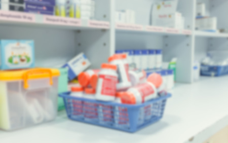 blur background drug shelves in drug store.の写真素材