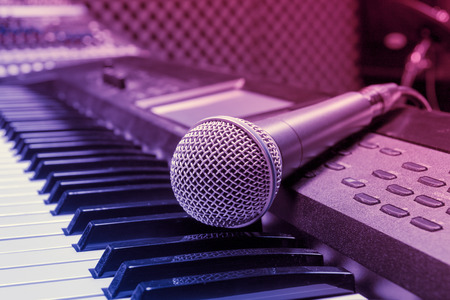 microphone on piano background.の写真素材