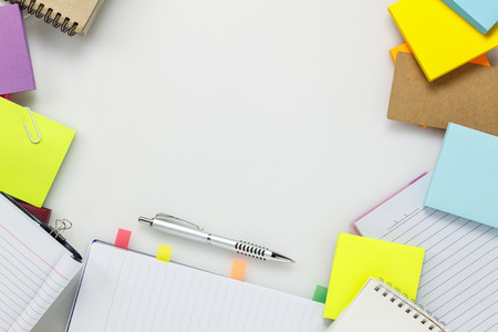 Top view  accessories business office desk.notebook pen paper note on white background with copy space.の写真素材
