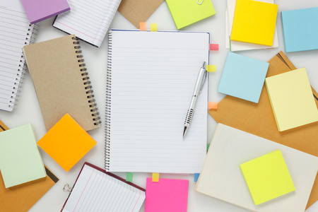Top view  accessories business office desk.notebook pen paper note on white background with copy space.の写真素材