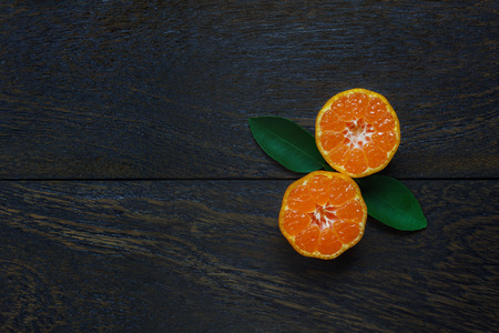 Top view sliced orange on rustic wooden with copy space.の写真素材