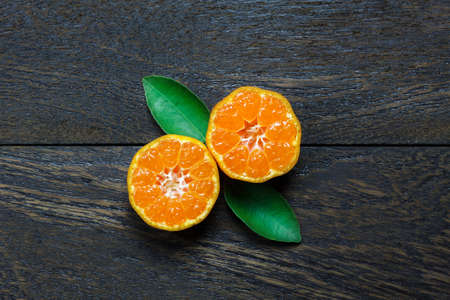 Top view sliced orange on rustic wooden with copy space.の写真素材